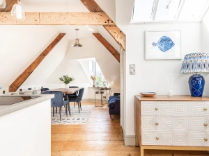 Bright and beautifully presented open plan dining and sitting area.
