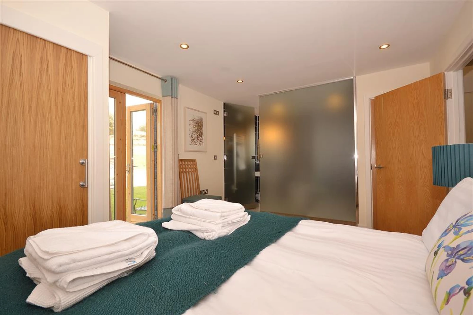 Another view of the master bedroom, showing the en suite