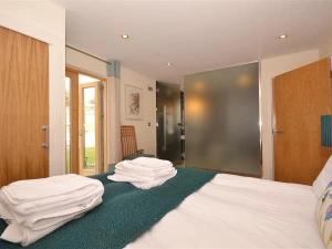 Another view of the master bedroom, showing the en suite
