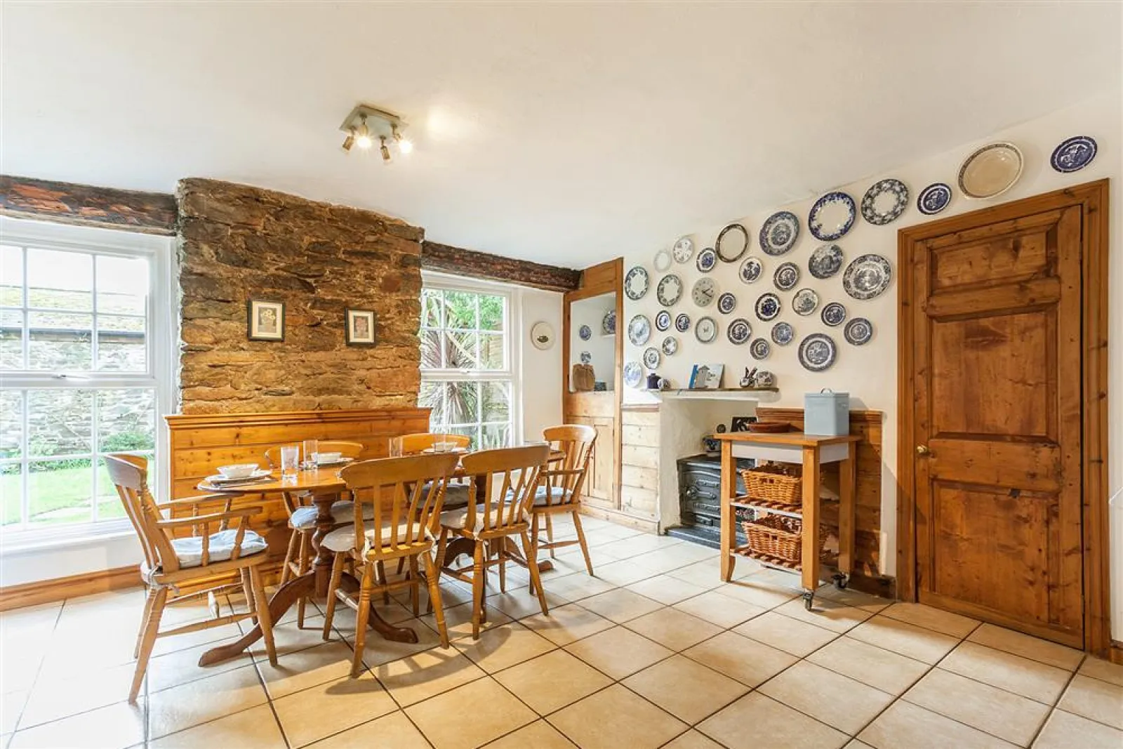 The dining area within the kitchen with views onto the garden.