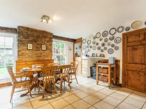 The dining area within the kitchen with views onto the garden.