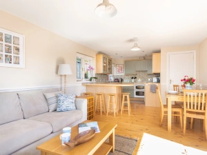 The open plan living space is ideal for coming together after a long day on the beach.