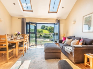 Spacious open plan living space with uninterrupted estuary views.