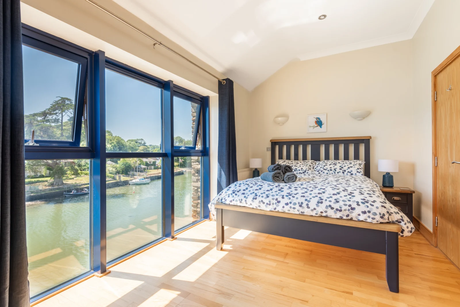 Spacious main bedroom with estuary views and en suite shower