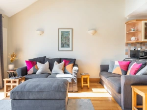 Comfortable lounge area looking out over the estuary and countryside beyond