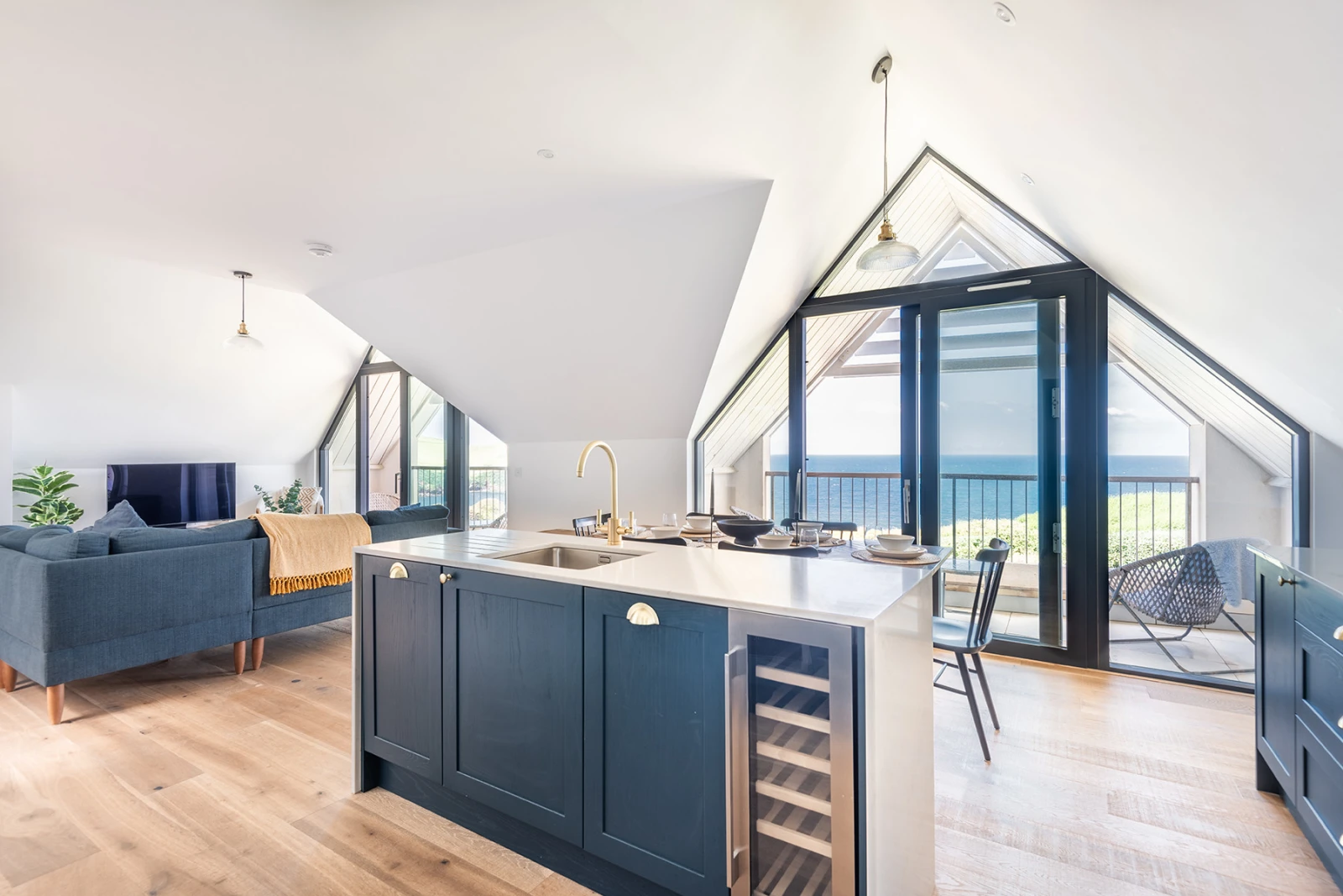 The open plan living area with stunning views and two balconies. 