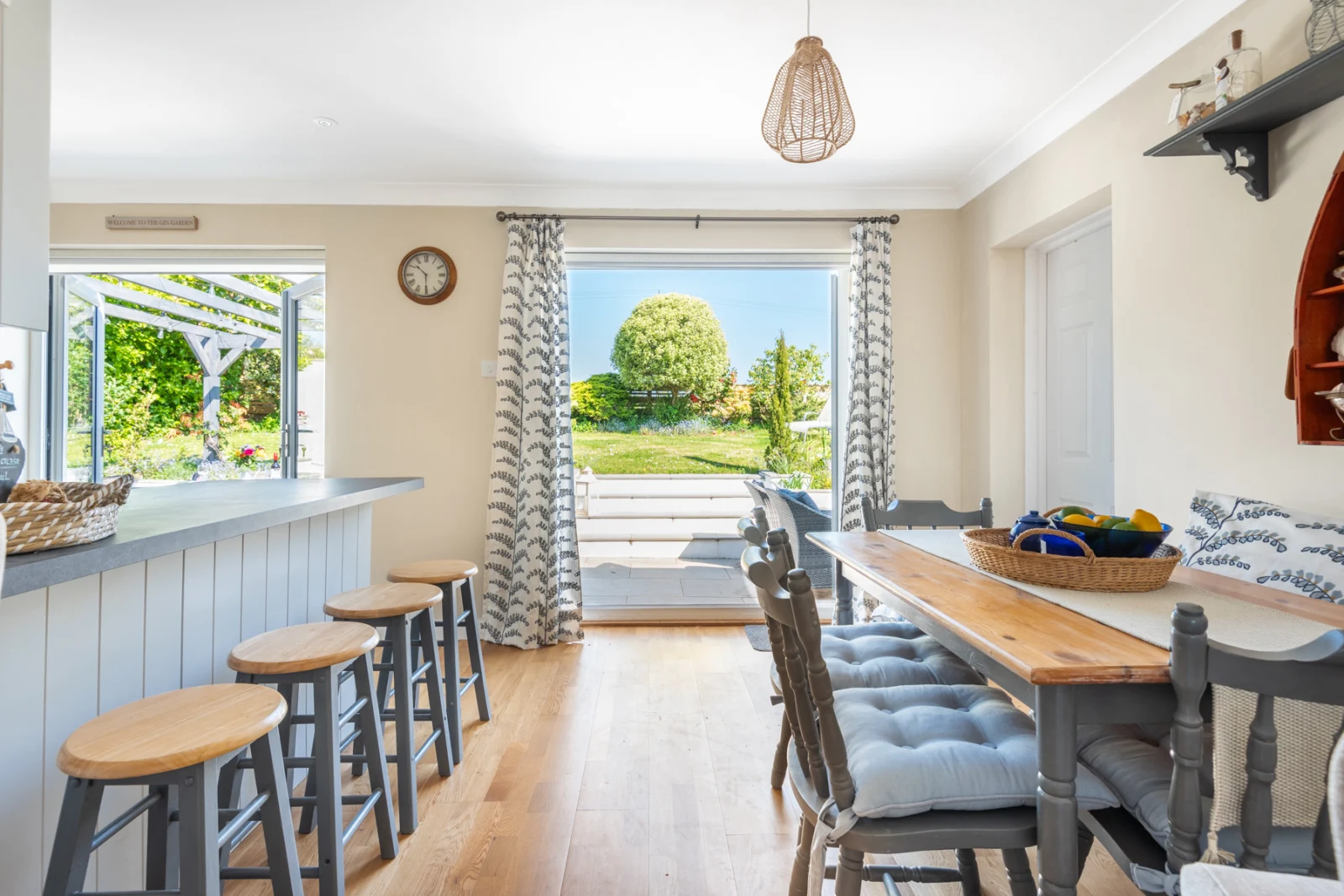 The dining area and breakfast bar looking out over the lovely garden