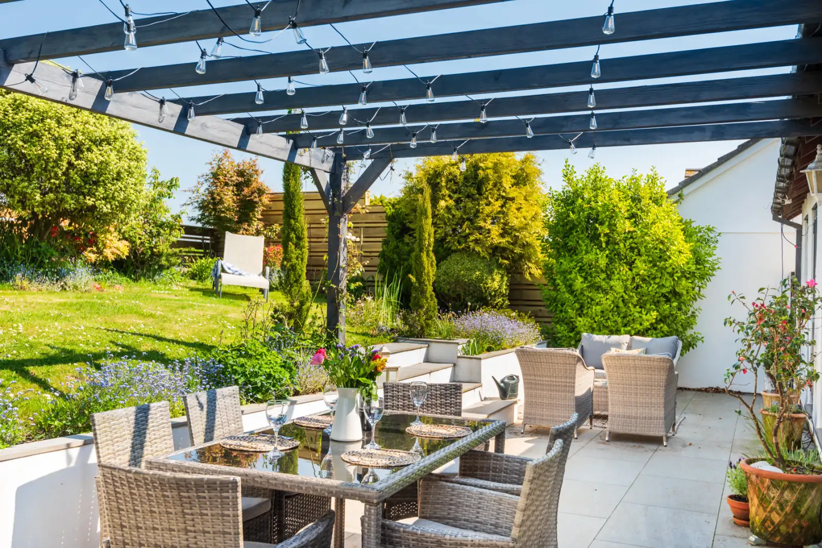 The beautiful terrace area with dining area and relaxed seating