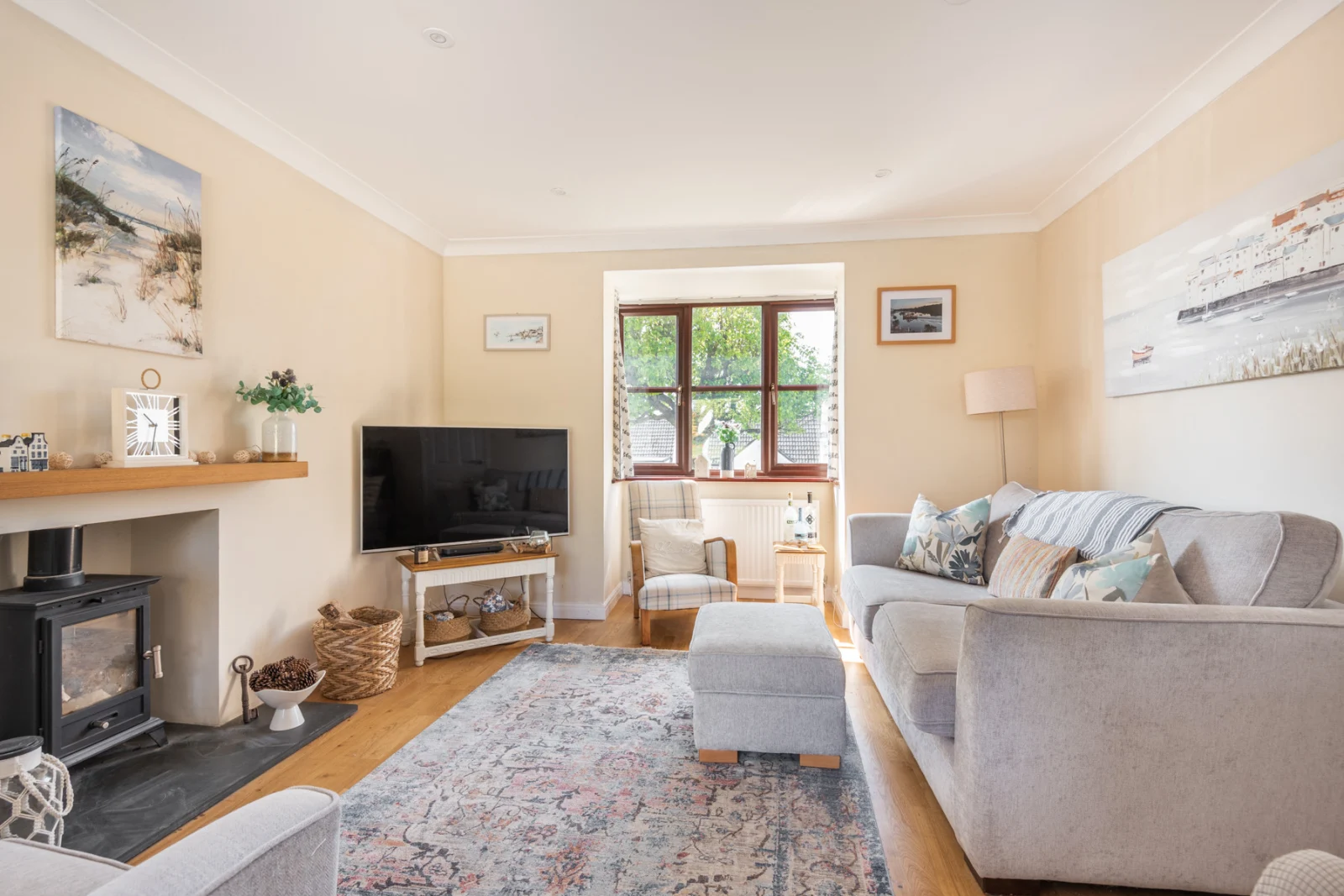 The living area with log burner perfect for relaxing any time of year.