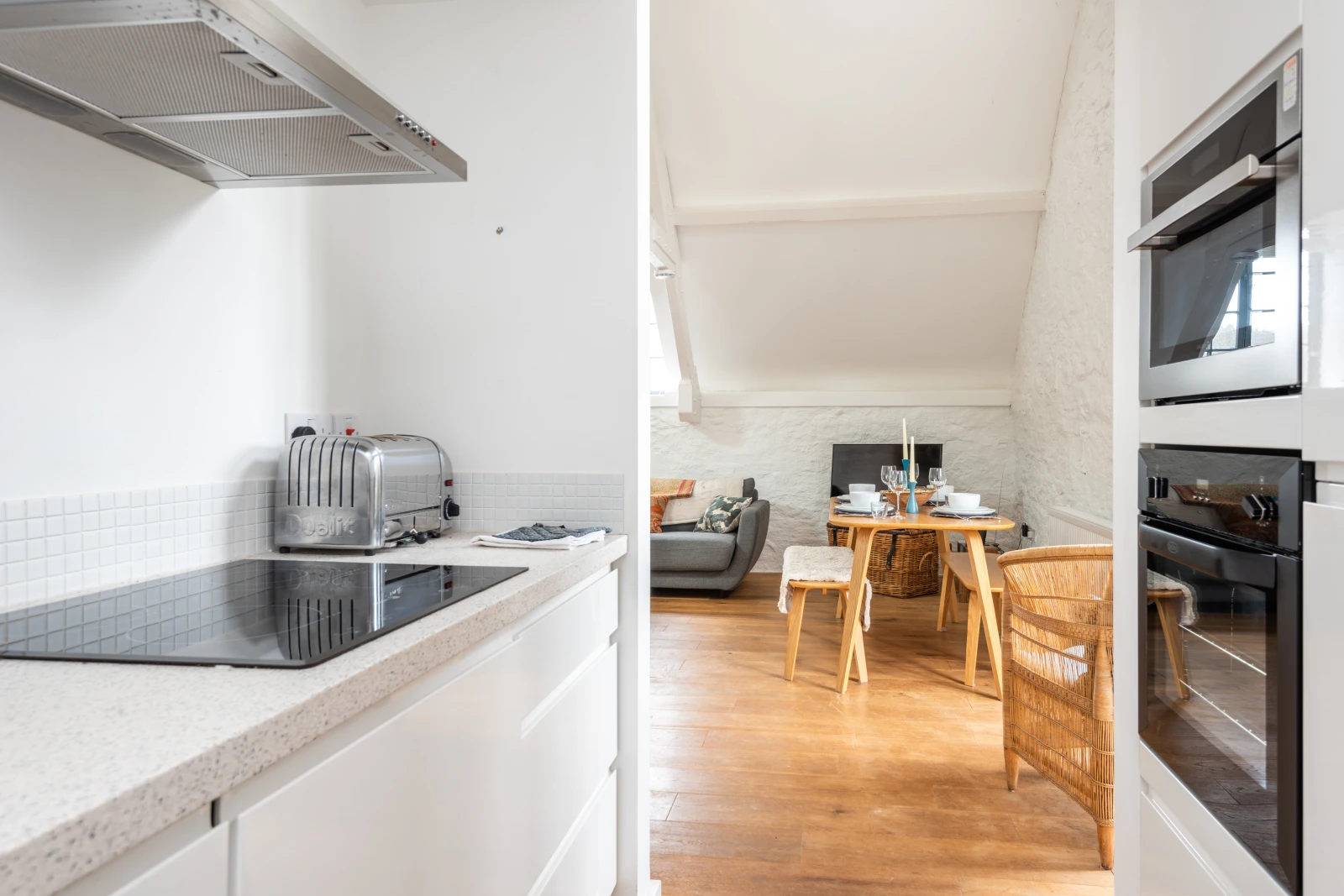 Galley kitchen through to the dining and sitting room.