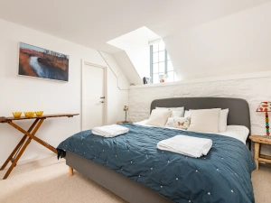 Master bedroom with super king size bed.