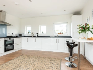 Spacious kitchen with a breakfast bar area 