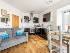 Another view of the open plan kitchen dining living space