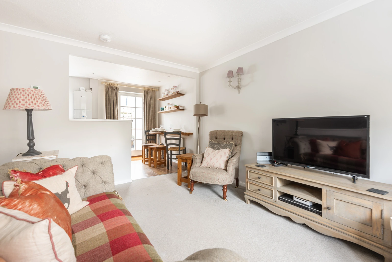 Another view of the living room looking through to the kitchen.