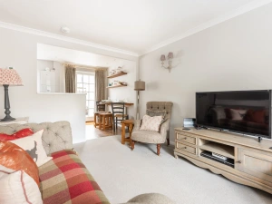 Another view of the living room looking through to the kitchen.