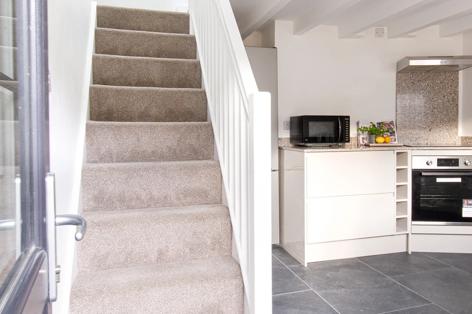 Stairs up to first floor from kitchen