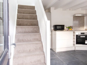 Stairs up to first floor from kitchen