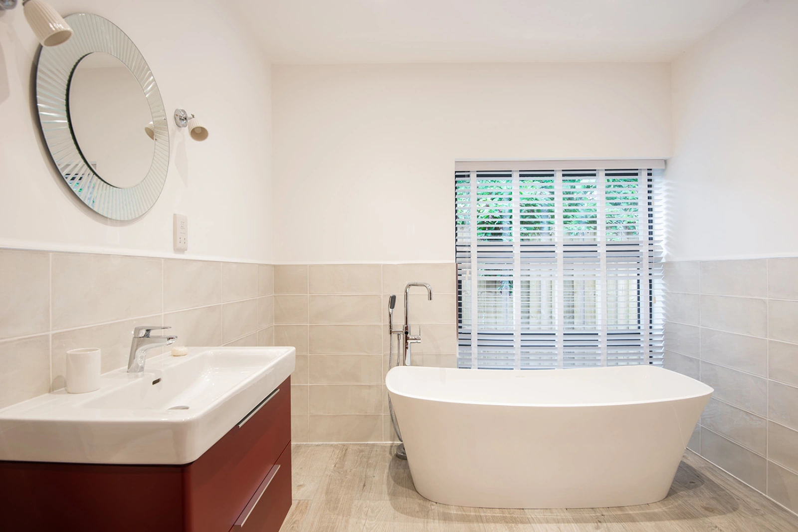 Downstairs family bathroom with freestanding bath