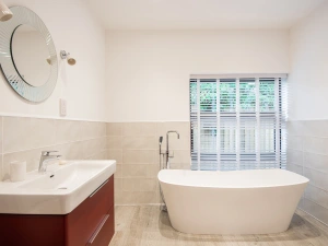 Downstairs family bathroom with freestanding bath