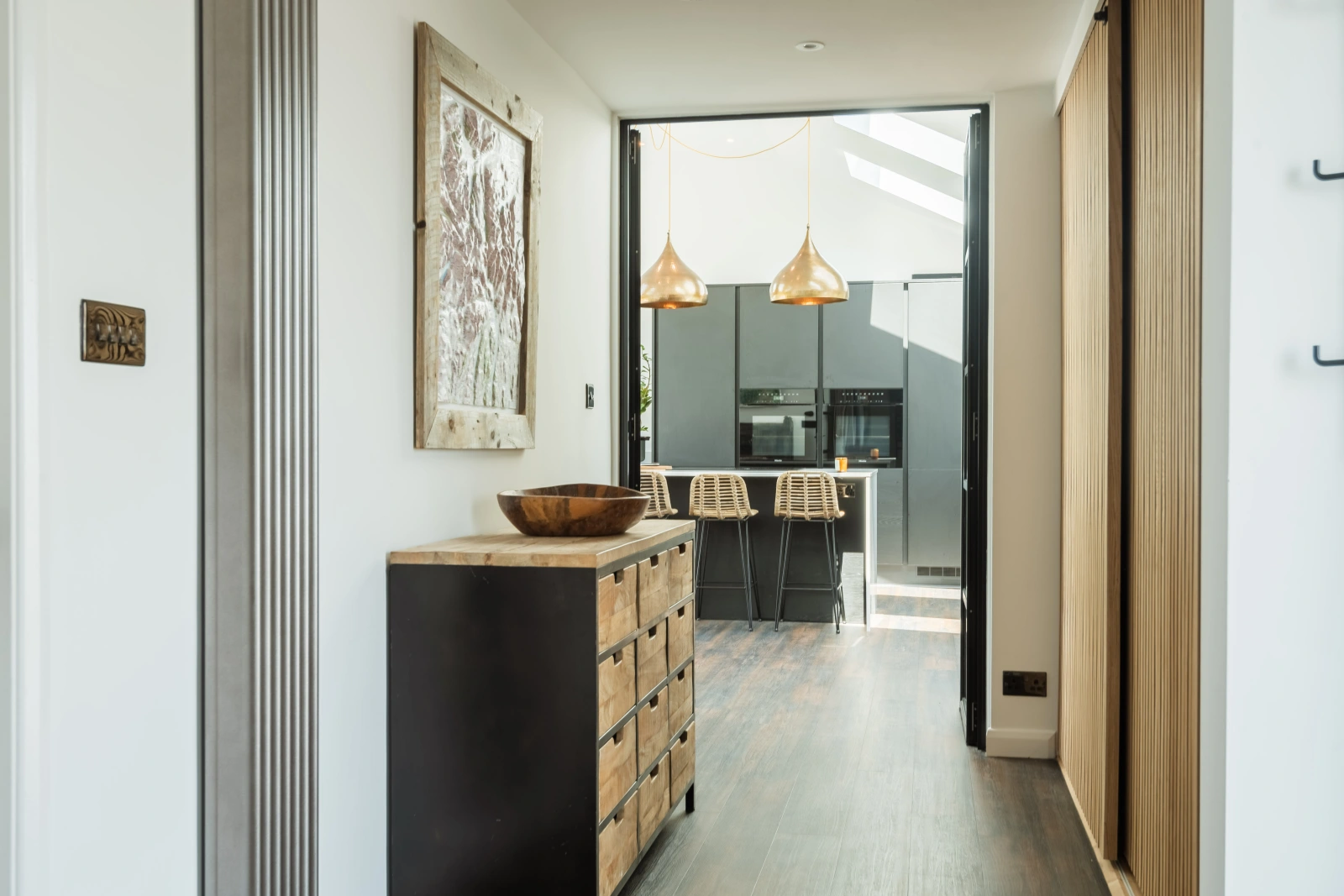 Peeking down to the beautiful kitchen diner in this 4 bed holiday home with views over the Salcombe and Kingsbridge estuary.