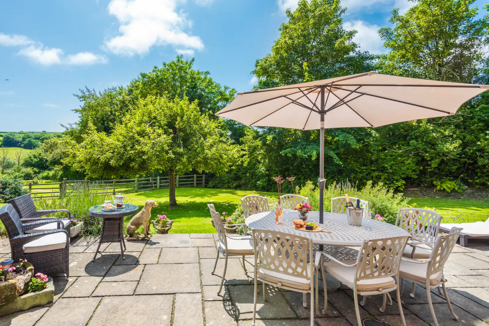 Relax on the large terrace amidst lovely private grounds