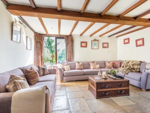 Relaxing sitting room with log burner