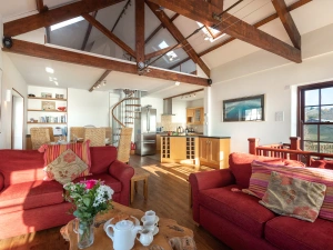 The open plan living/kitchen/dining room