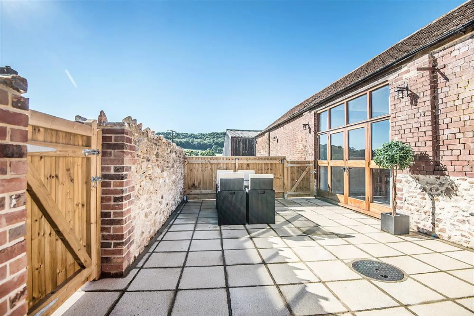 The sunny patio with countryside views