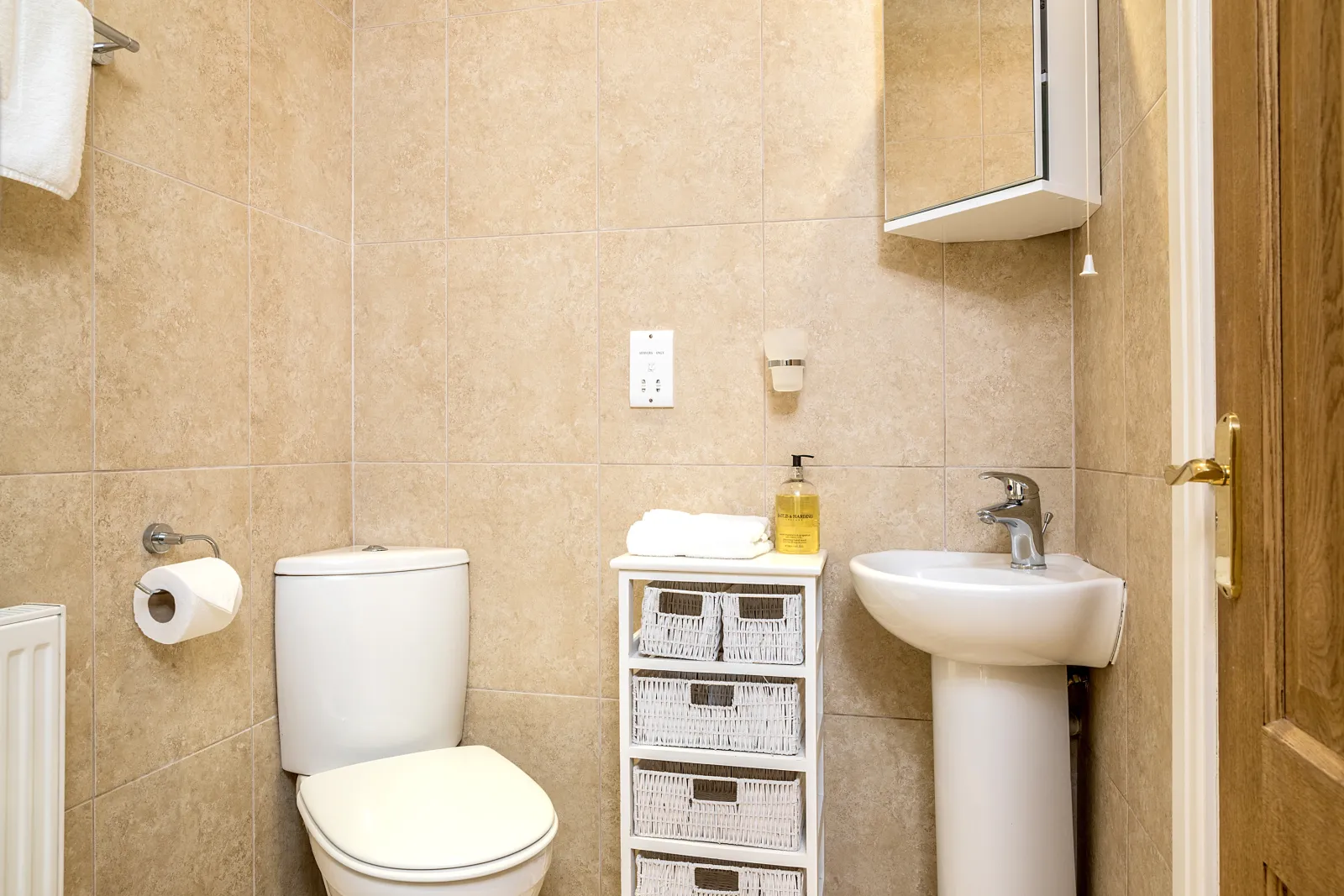 The en-suite with large walk-in shower, wc and hand basin.