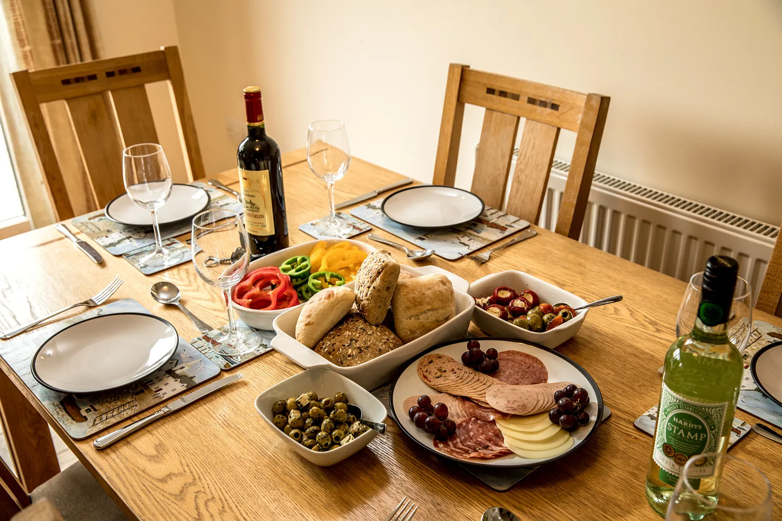 There's ample space at the dining table for family meals or a game of Trivial Pursuit.