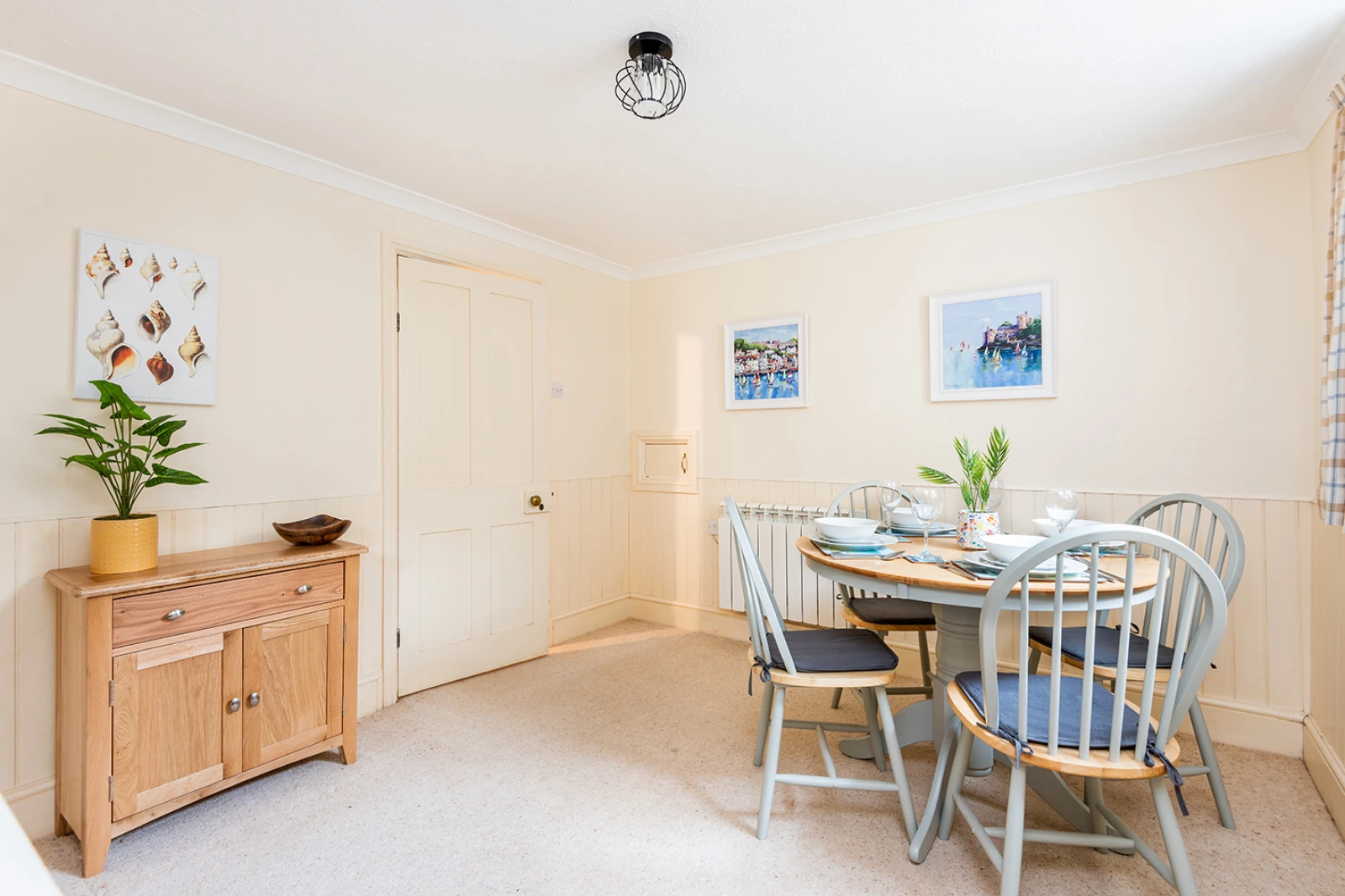 The pretty dining room just off the kitchen