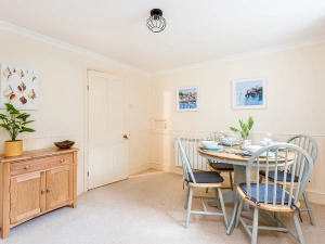 The pretty dining room just off the kitchen