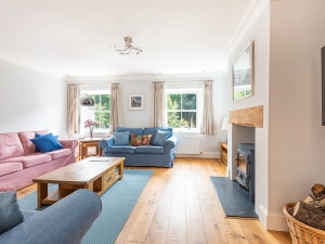 The spacious bring lounge with log burner 