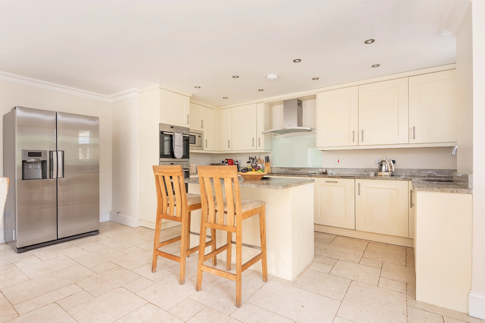 The kitchen with breakfast bar