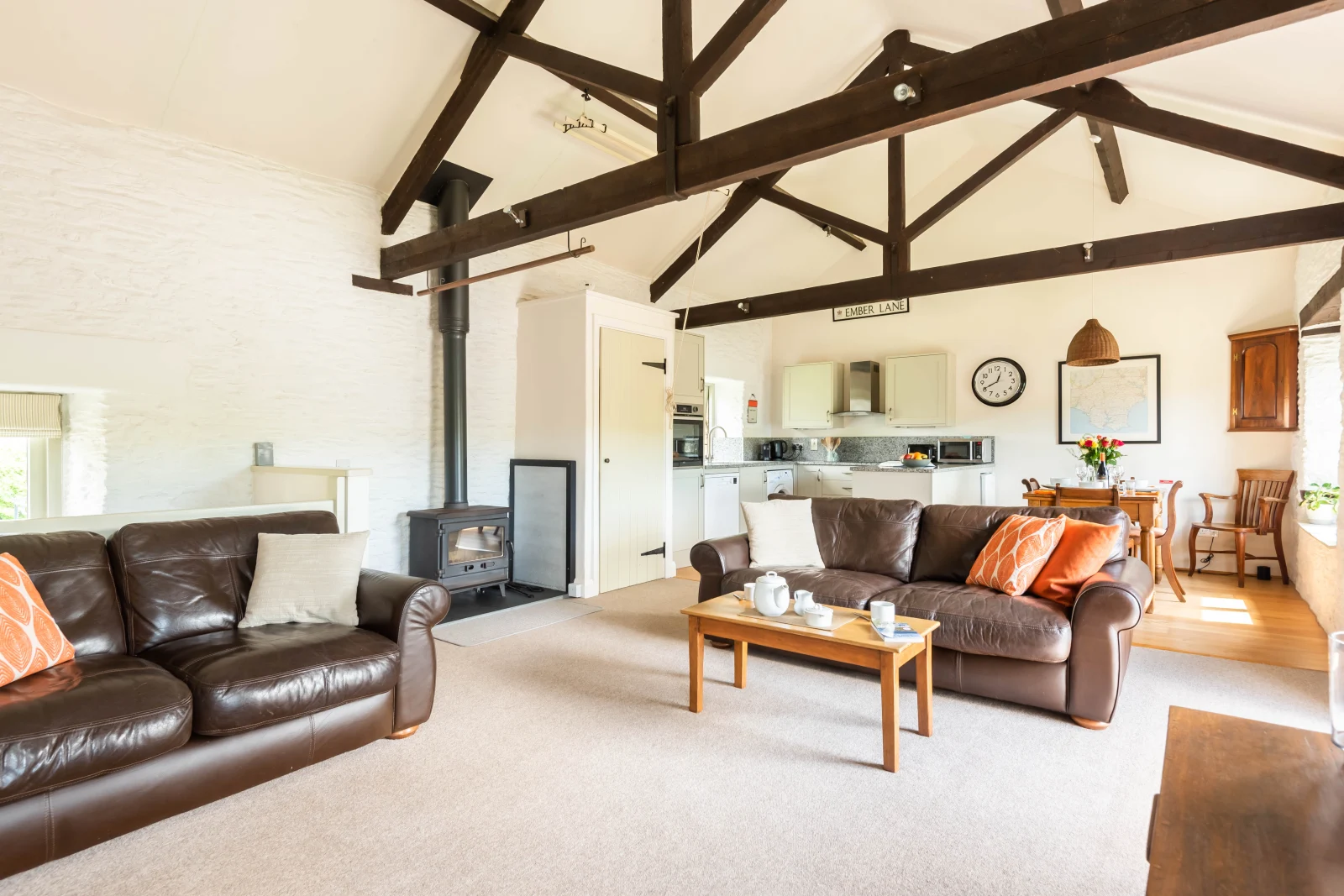 Stunning living area with high ceilings and stylish decor