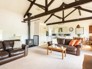 Stunning living area with high ceilings and stylish decor