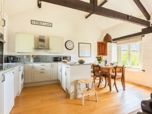 Another view of the kitchen and dining area