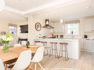 Modern kitchen diner with breakfast bar. 