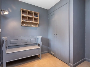 The very useful and still tastefully decorated boot room.