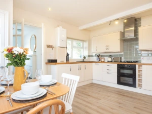 The lovely open-plan kitchen dining room. 