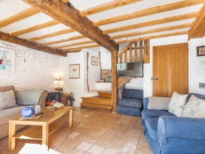 The sitting room with woodburner stove.