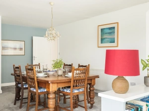 The dining area had a large family table - perfect for sharing meals or playing a board game together.