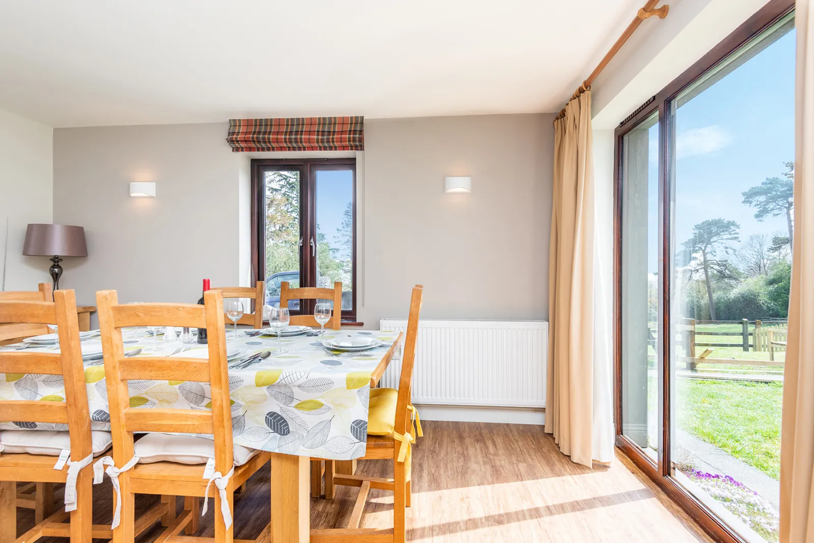 The dining table can seat 6 guests.