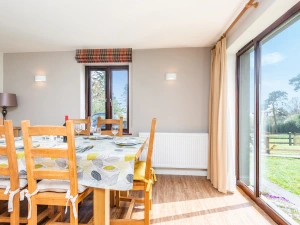 The dining table can seat 6 guests.