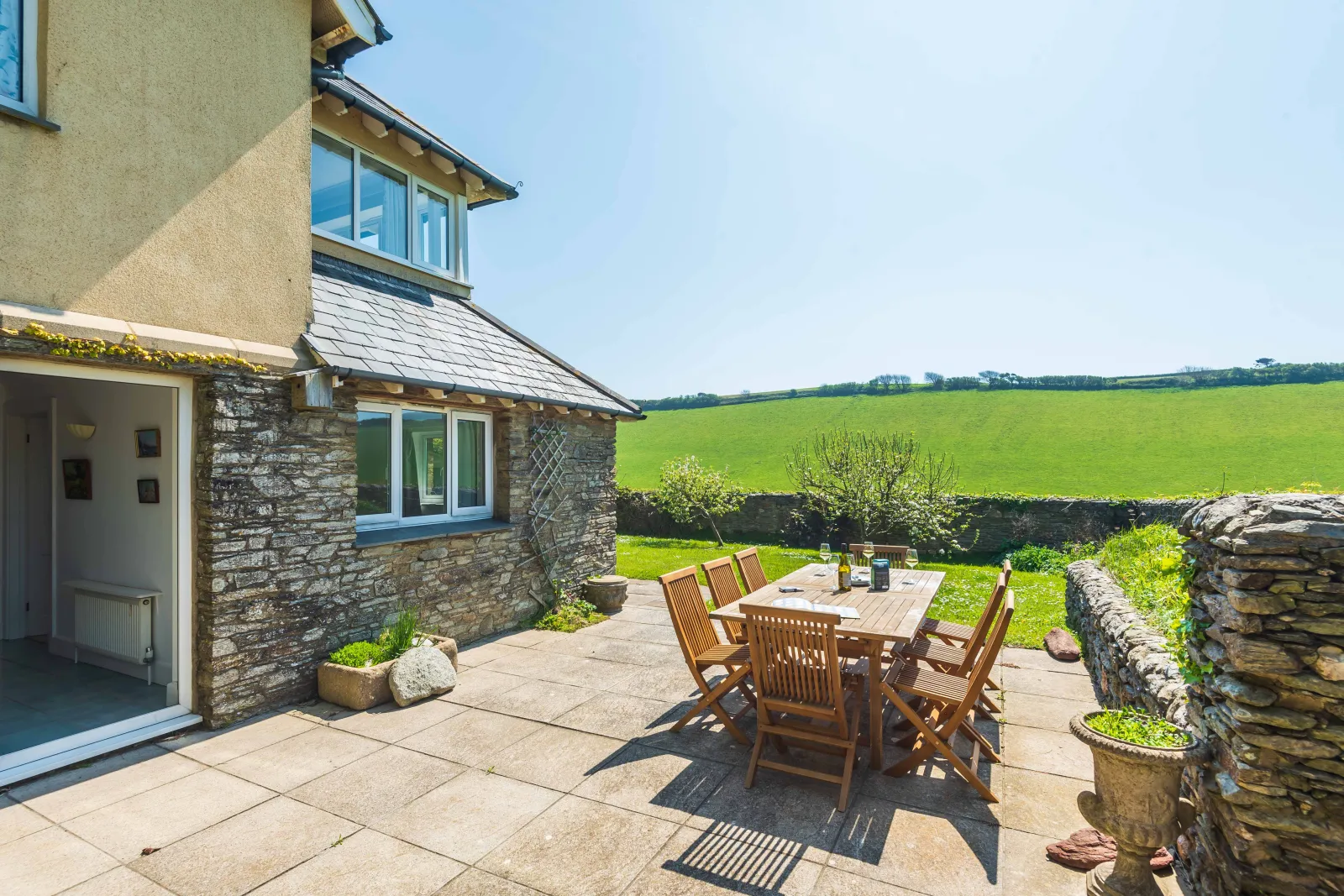 Exterior. Lower private terrace and dining area