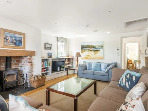 Separate sitting room with log burner