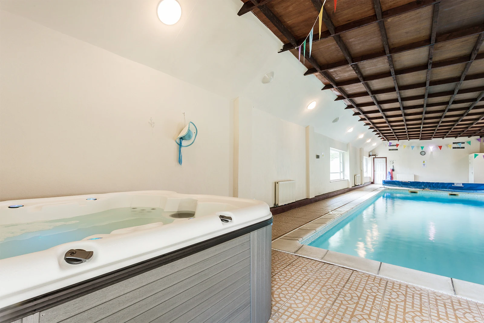 Hot tub and swimming pool.