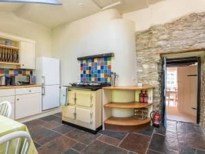 Showing the door leading from dining room into the kitchen.