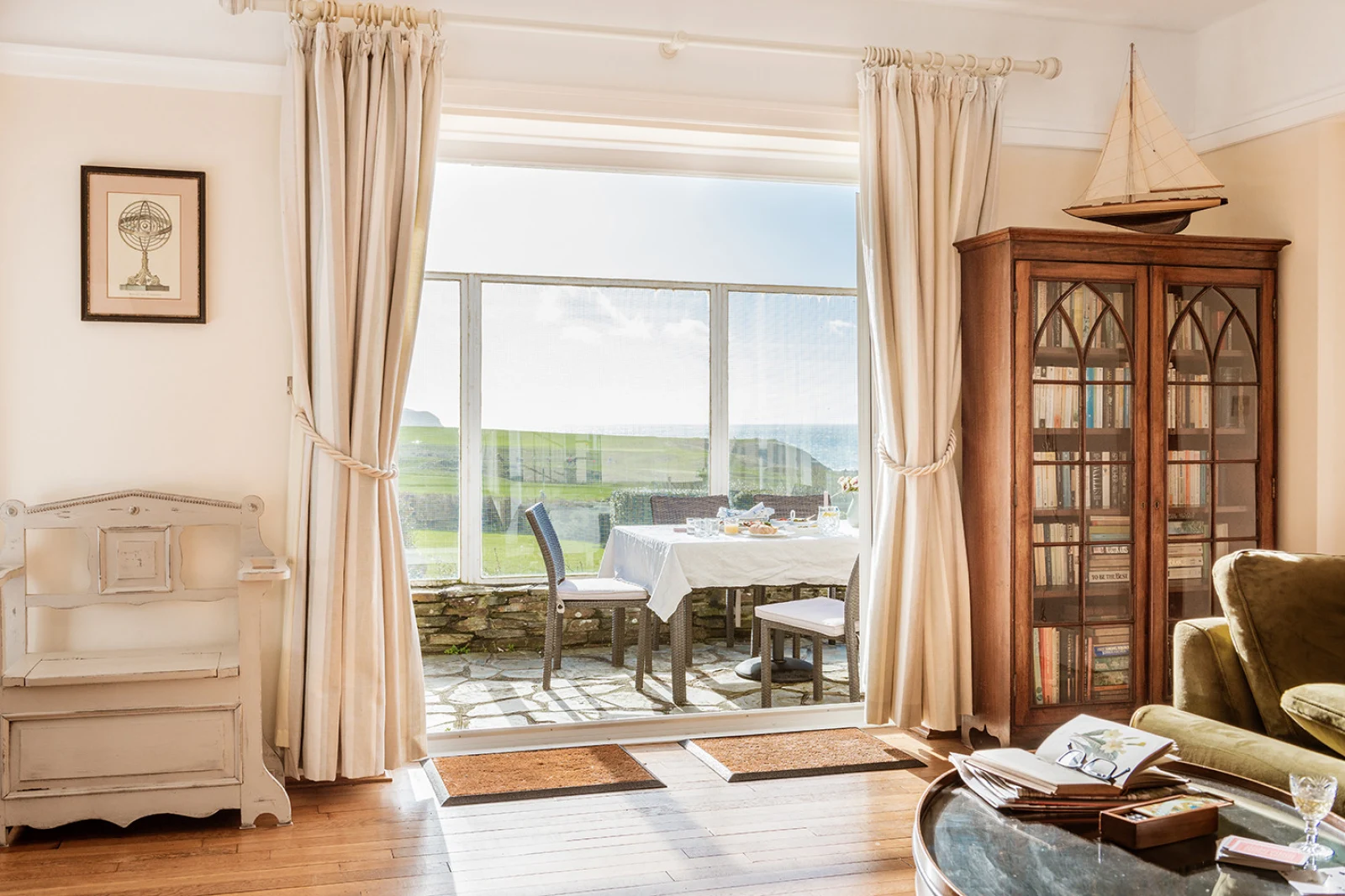 Another view of the Lounge looking through the french doors onto the Patio.