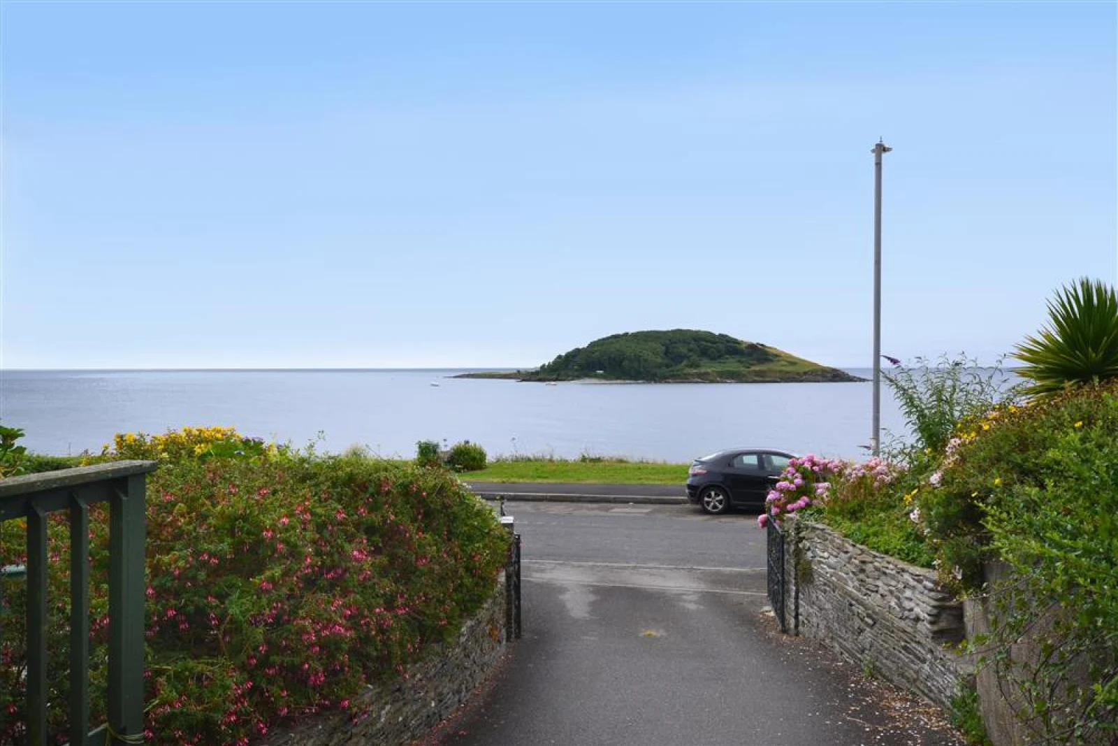 The driveway to the property, showing Looe Island 